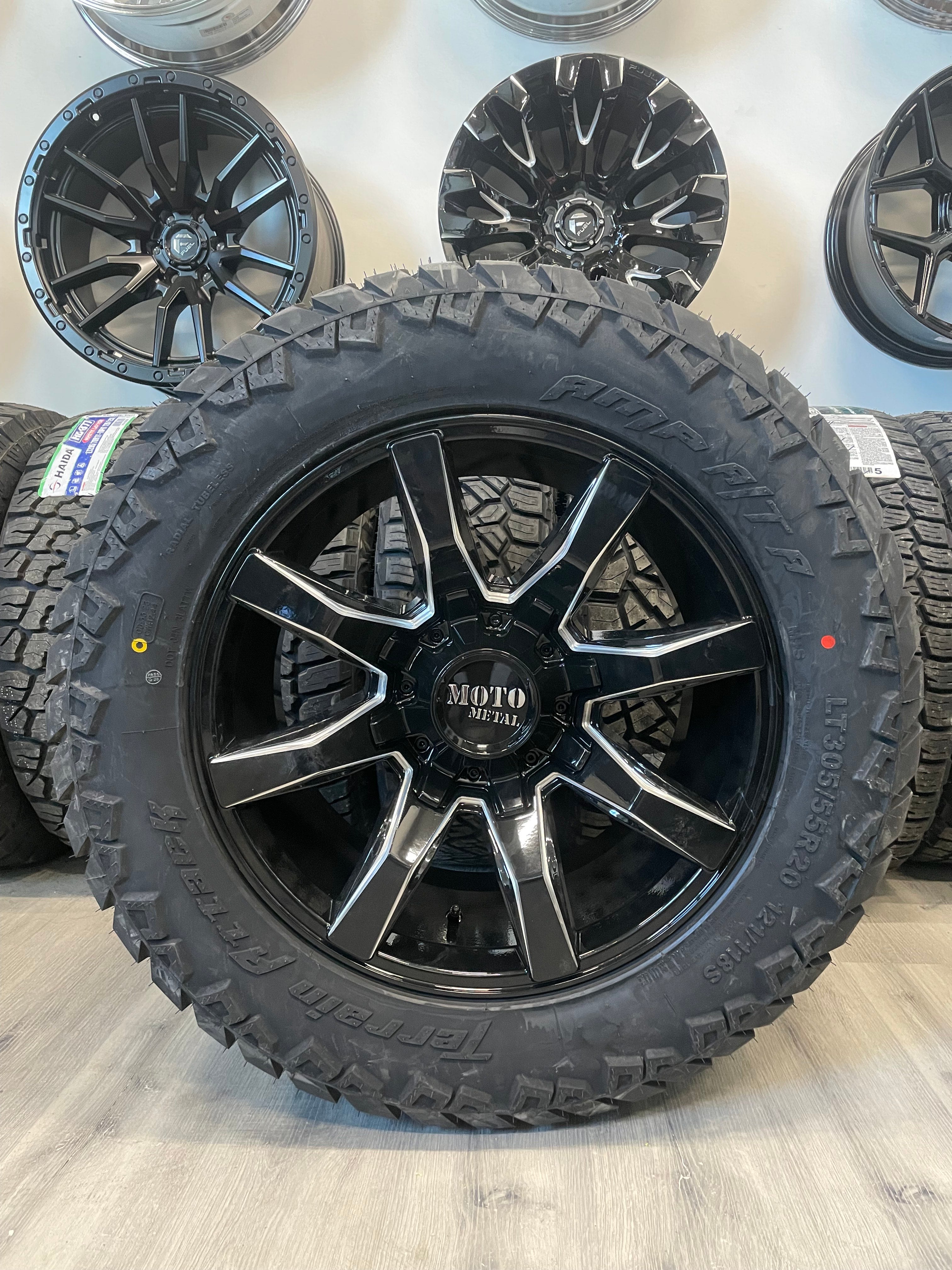 (SET OF FOUR) Moto Metal MO804 20x10 8x165.1 -18 Gloss BLK Milled | LT305/55r20 Amp Attack AT