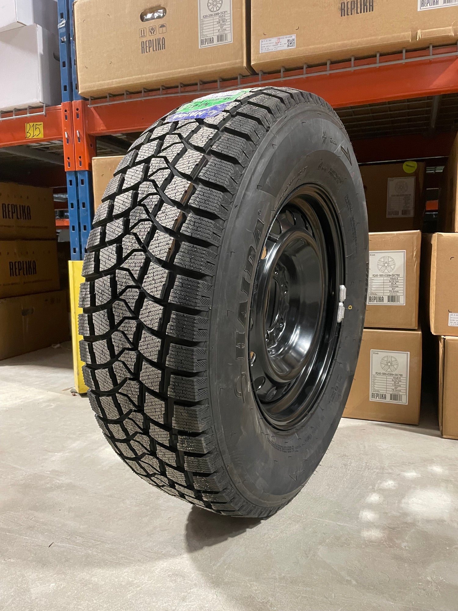 (SET OF FOUR) Performance Steel Wheel 17x7 6x139.7 +14 BLK | 265/70r17 Haida 617 Winter ( GMC, CHEVY 1500, Yukon, Tahoe, Tacoma )