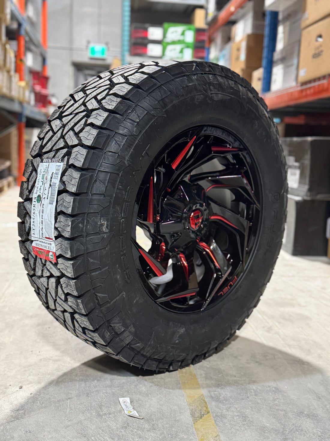 ( SET OF FOUR )  FUEL REACTION 18X9 +1 5X139.7/5X150 110.2 GLOSS BLACK MILLED W/ RED TINT | 285/65R18 FUEL GRIPPER AT