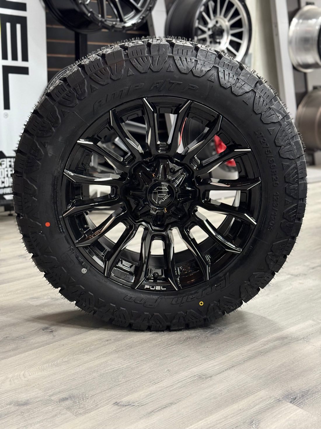 (SET OF FOUR) Fuel Blade Gloss BLK MILLED 20x9 6x135/6x139.7 +1 106.1MM | LT 275/60r20 Amp Terrain Pro 10PR