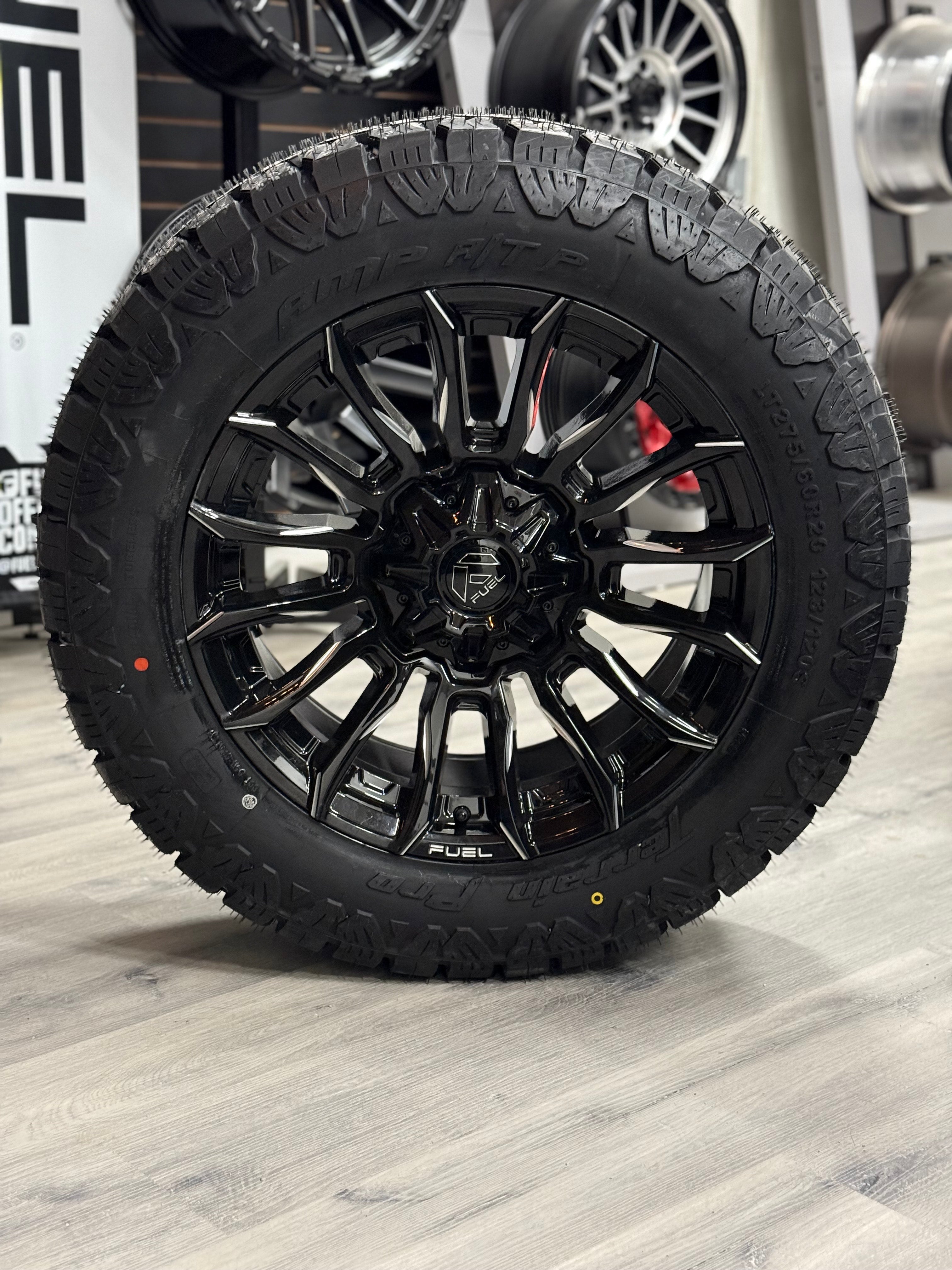 (SET OF FOUR) Fuel Blade Gloss BLK MILLED 20x9 6x135/6x139.7 +1 106.1MM | LT 275/60r20 Amp Terrain Pro 10PR