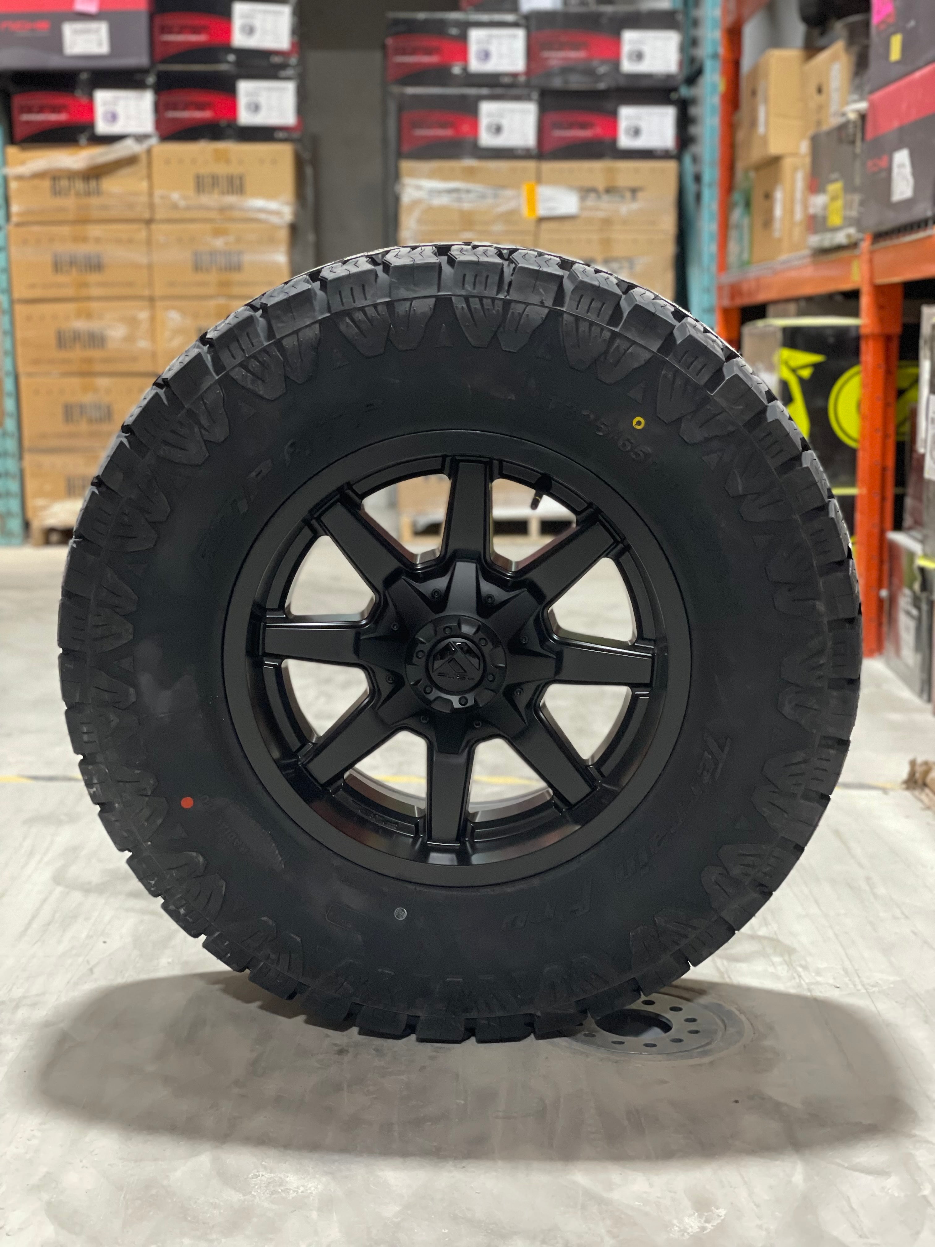 (SET OF FOUR) Fuel Maverick 18x9 8x165 +20 Matte BLK | 325/65R18 Amp Terrain Pro