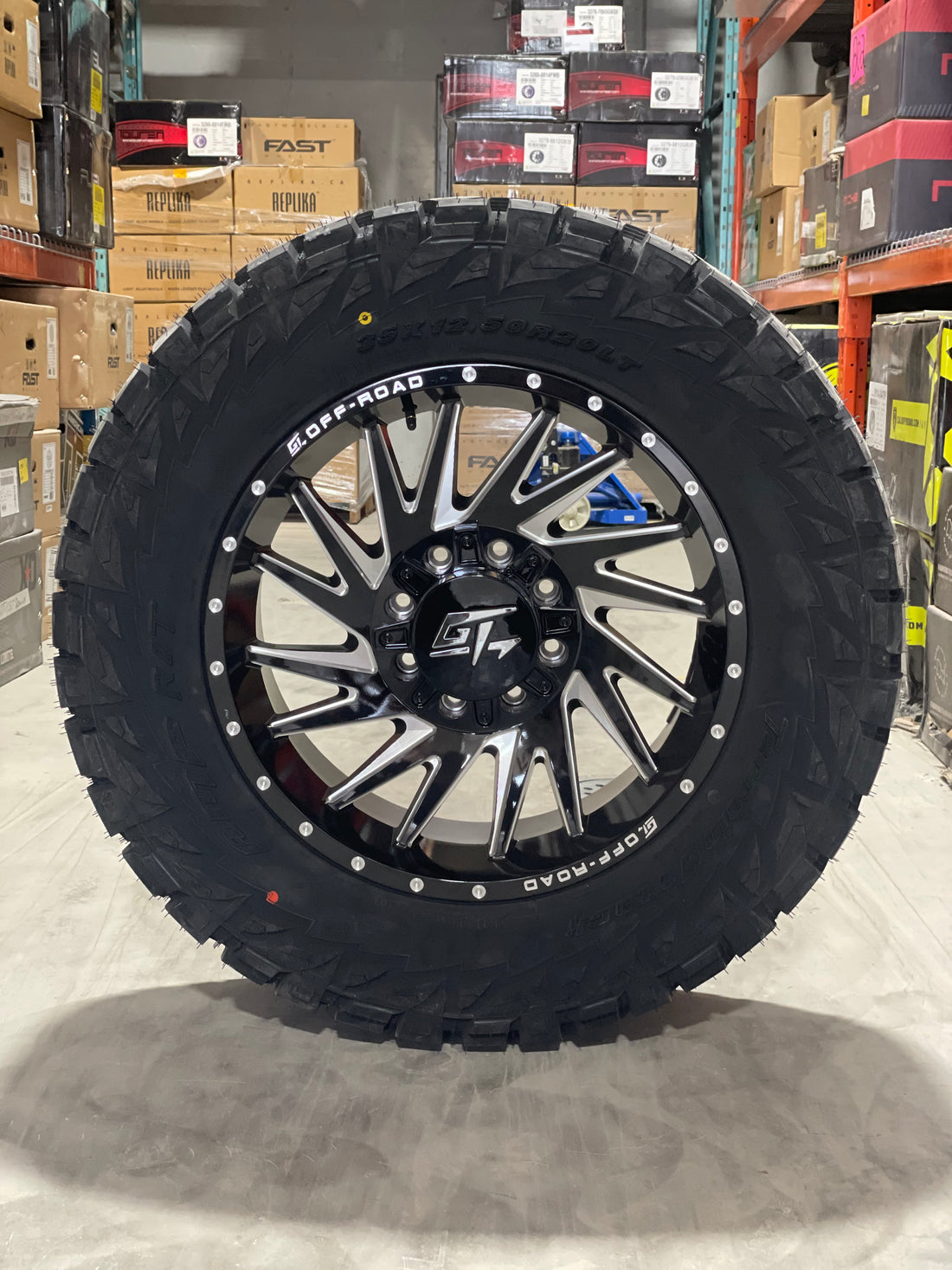 (SET OF FOUR) GT Tomahawk 20x9 8x165.1/8x180 +12 Gloss BLK Milled | 35x12.50r20 Amp Terrain Attack R/T